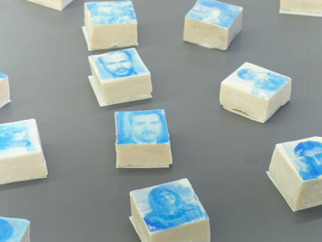 Areej Kaoud, Clean Kill, 2024, Screenprint on Nabulsi soap, Royal blue on olive oil soap, 7 x 7 cm per soap
