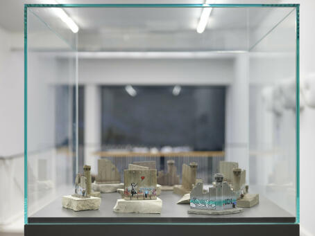 Banksy, miniature wall sculptures from The Walled Off Hotel in Bethlehem, 2018, enhanced polymer resin, hand painted details