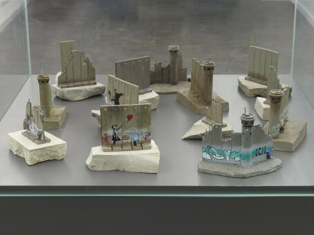 Banksy, miniature wall sculptures from The Walled Off Hotel in Bethlehem, 2018, enhanced polymer resin, hand painted details