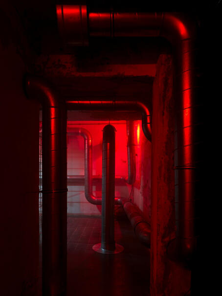 Hannah Perry, BPM (Thrash), 2026, air vent tubing, 12 subwoofers, rebar caging, padlocks, sound piece 8 min 10 sec, 245 x 180 x 180 cm