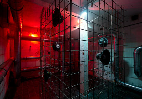 Hannah Perry, BPM (Thrash), 2026, air vent tubing, 12 subwoofers, rebar caging, padlocks, sound piece 8 min 10 sec, 245 x 180 x 180 cm