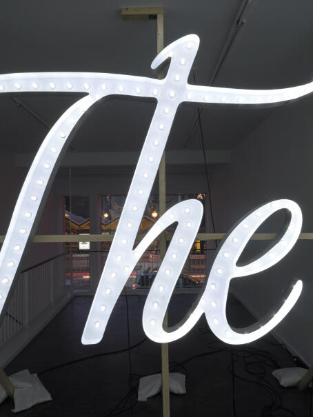 Banks Violette, Untitled (The End), 2026, mdf, aluminium, light bulbs, lacquer paint, wooden scaffold, electrical wiring, 206 x 270 cm