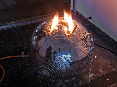 Banks Violette, Untitled (Discoball), 2026, Metal, mirror, steel, salt, gas, chain, fire, diameter 55cm