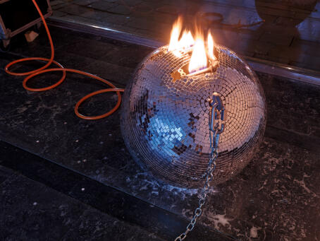 Banks Violette, Untitled (Discoball), 2026, Metal, mirror, steel, salt, gas, chain, fire, diameter 55cm