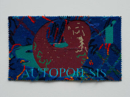 METAHAVEN, Autopoiesis [Bus seats], 2023 embroidery on bus seat fabric 15 x 27 cm