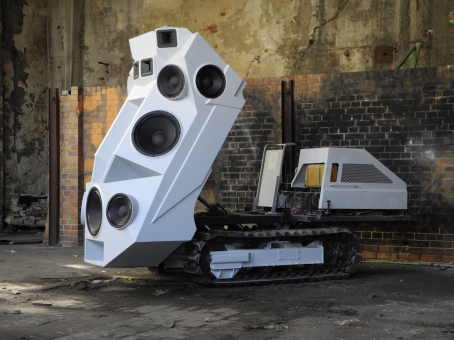 Nik Nowak, Panzer, 2011. Mini dumper, wood, GRP, lacquer, loudspeaker chassis, 4,000-watt amplifier, audio equipment. 250 × 140 × 350 cm.